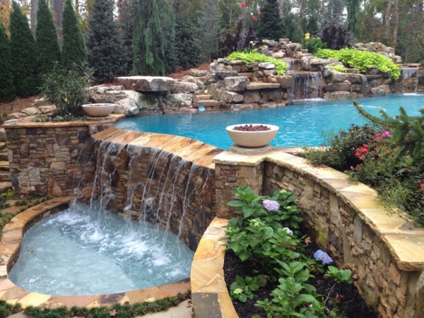 Custom pool with waterfall and spa